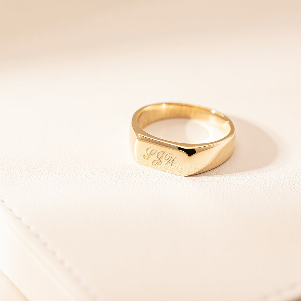 Signet ring engraved with PJW