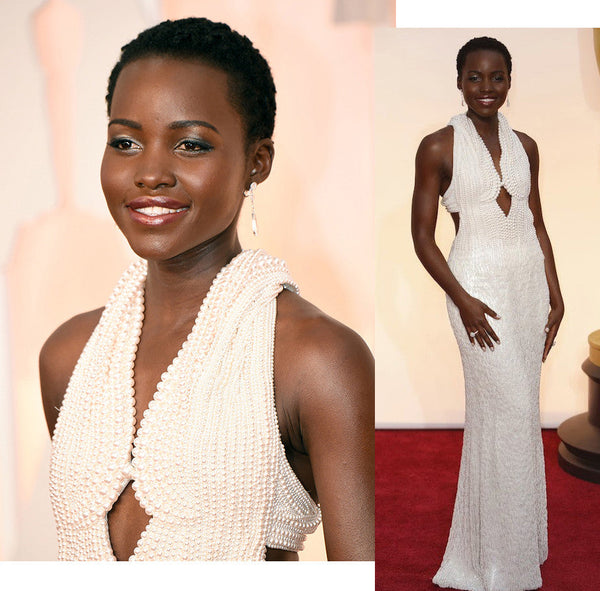 Lupita wearing a pearl dress
