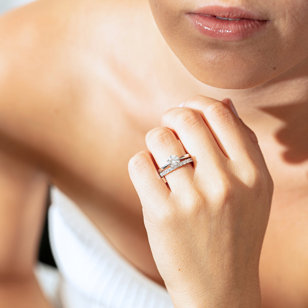 Model wearing diamond Nova and Panorama rings