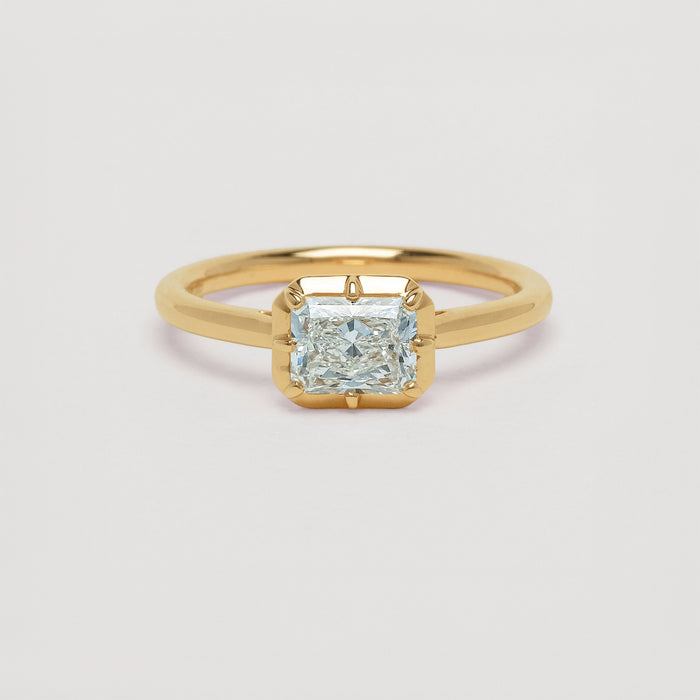 Yellow gold diamond Dawn Ring on light grey background