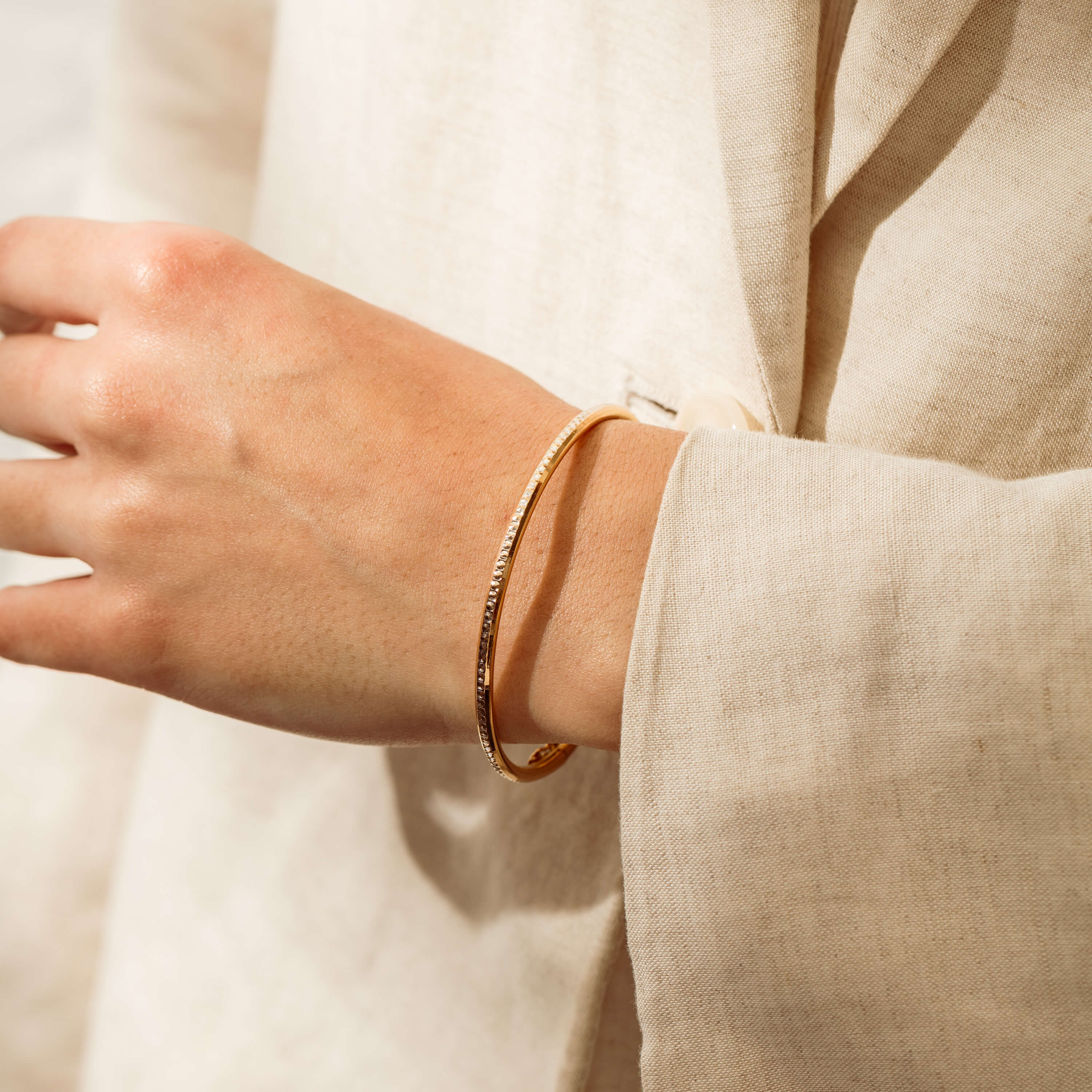 Deja Vu 22ct Yellow Gold Rhodium Plated Hollow Bangle – Walker & Hall