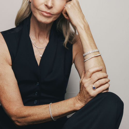 Model wearing natural diamond pieces from the 1899 Collection