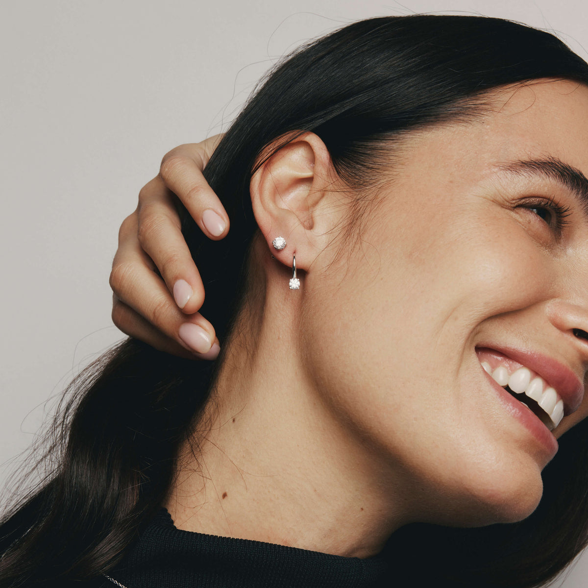 Model wearing Natural Diamond Blossom Stud Earrings and Drop Earrings