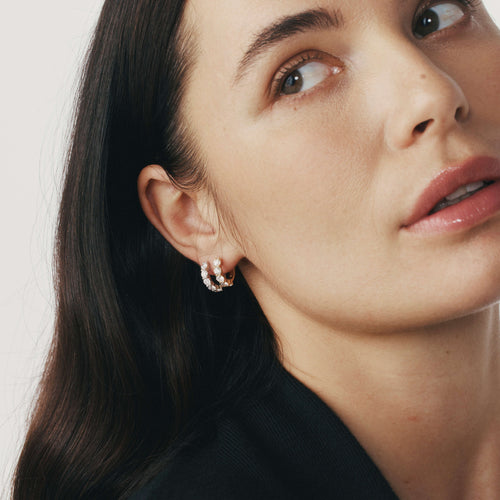 Close up of model wearing Diamond Panorama Hoop Earrings