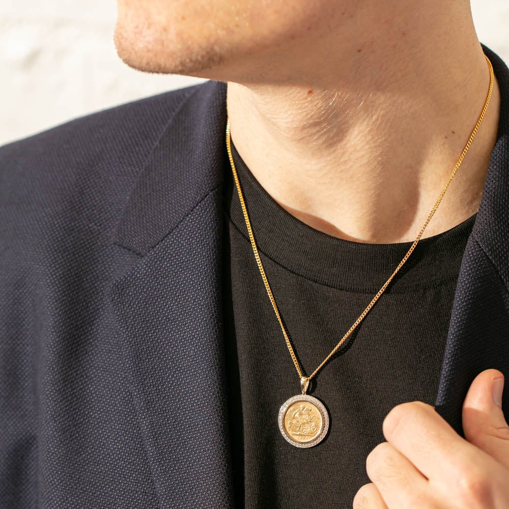 FULL SOVEREIGN COIN MOUNTED IN 9CT GOLD PENDANT AND CHAIN